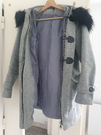 Fermeture refaite et pose attache avec brandebourg. Cliente ravie 